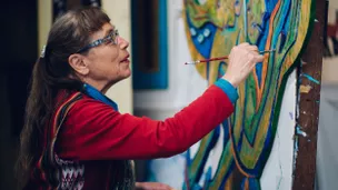 (C) Claire Thorington - Betty Laduke paints at her studio in Ashland.